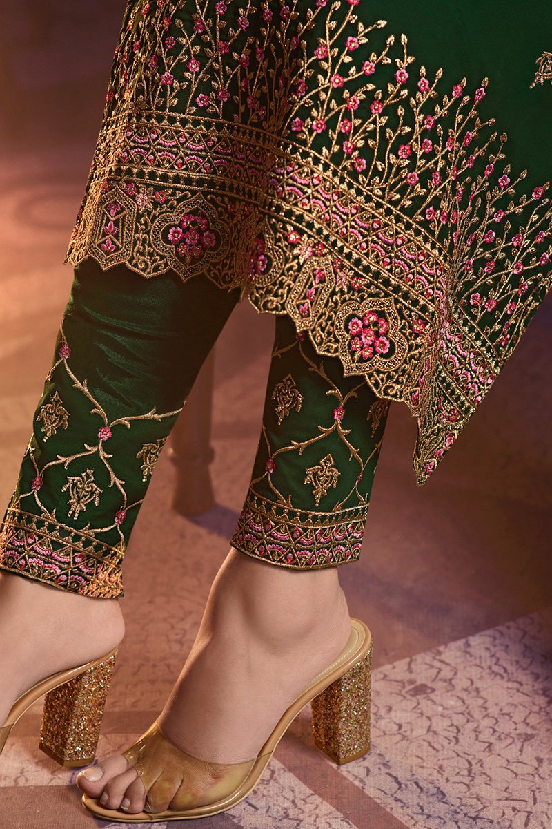Emerald shaded Green Faux Georgette suit with graceful artwork and embroidery