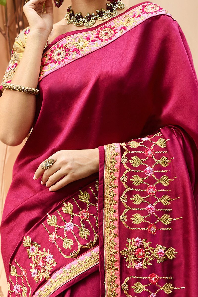 Wine Colored Silk Saree with Gold Colored Blouse