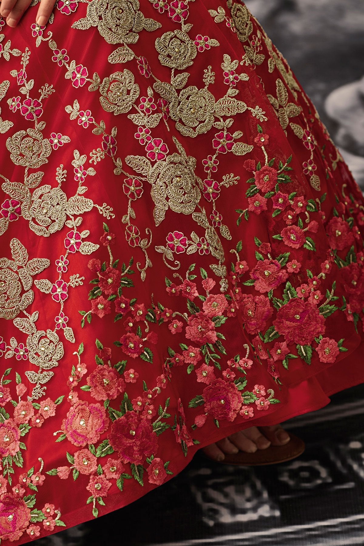 All Red Anarkali suit with exclusive stone works and motifs