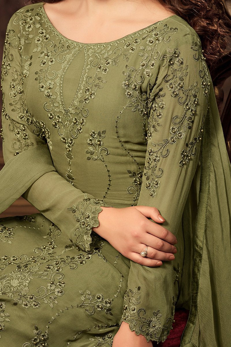 True Henna-Green Georgette suit with nice and gentle artwork