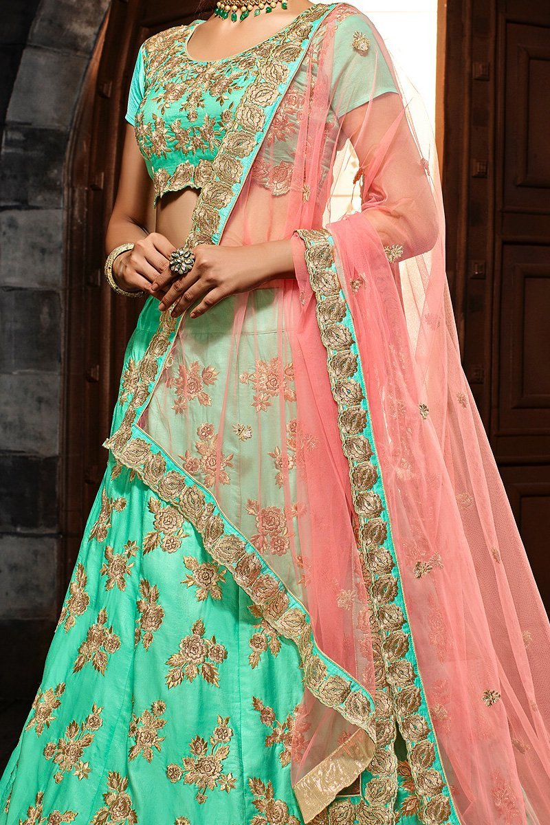 Turquoise-Blue lehenga set with well-crafted gold artwork