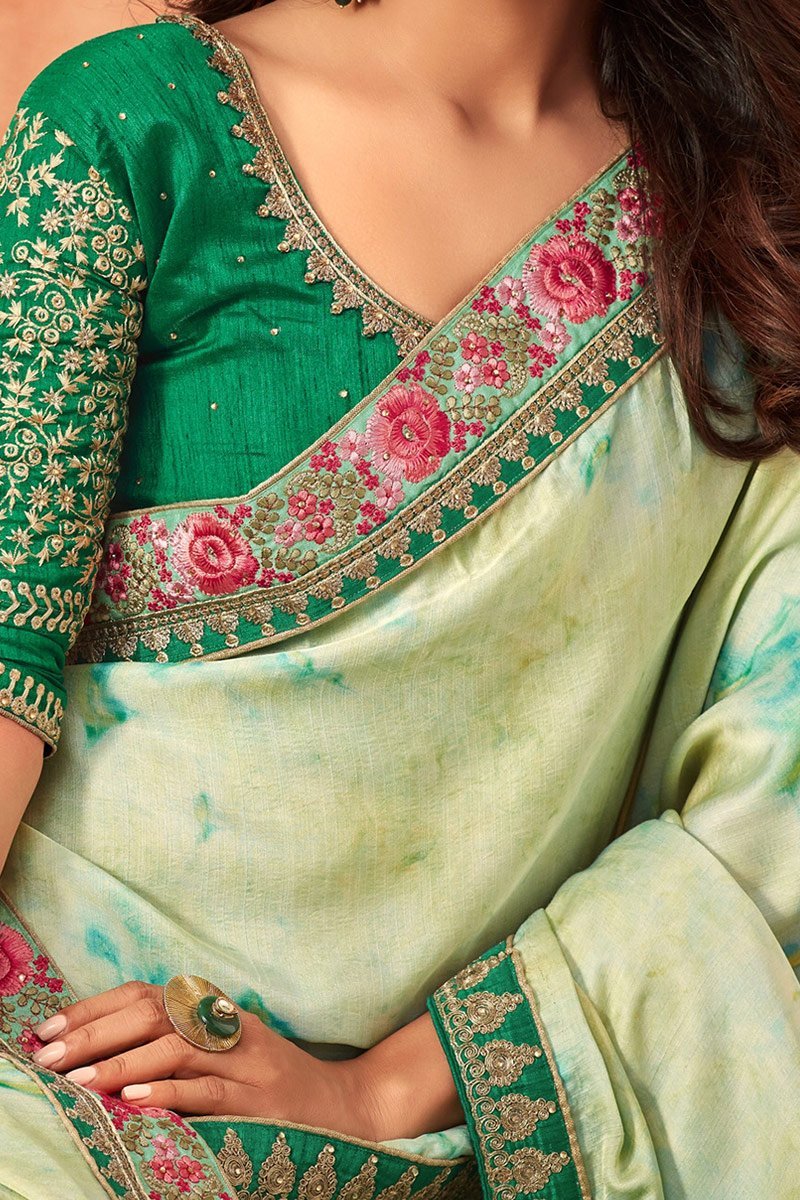 Frost-White Monarch Silk saree with Pine-Green Blouse