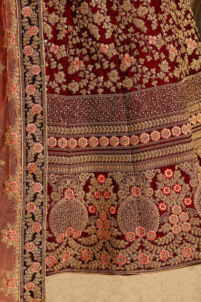Stunning Maroon colored Pure Velvet Lehenga set