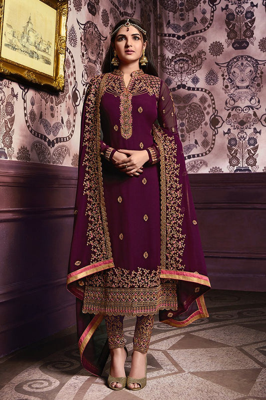 Bergundy Faux Georgette suit with heavy artwork and embroidery