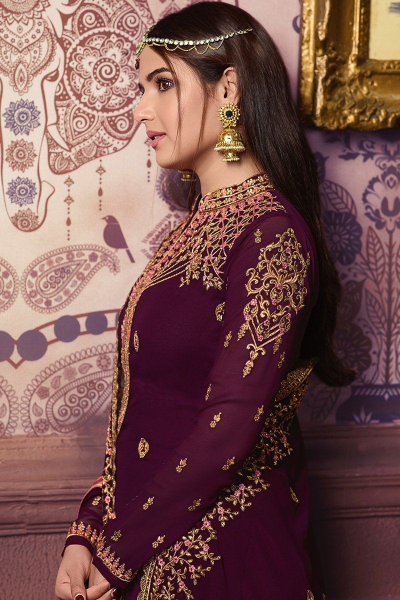 Bergundy Faux Georgette suit with heavy artwork and embroidery