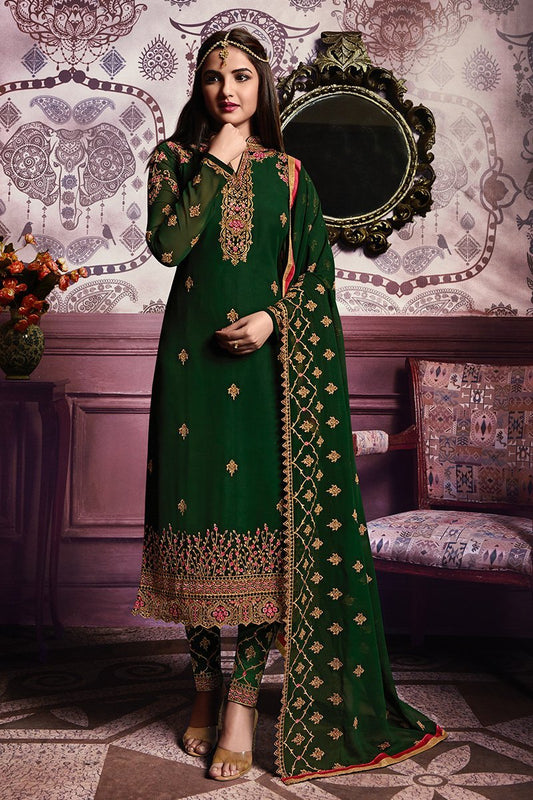 Emerald shaded Green Faux Georgette suit with graceful artwork and embroidery