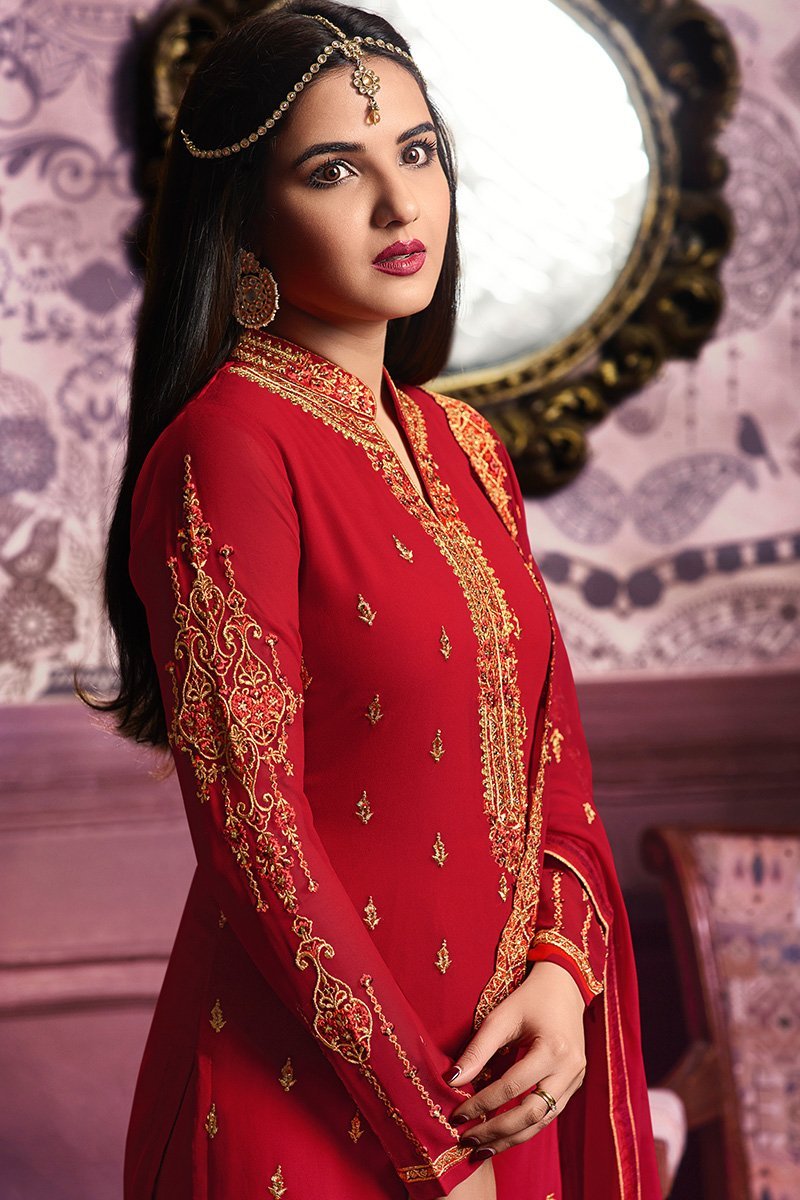 True-Red Faux Georgette suit with light yet graceful artwork all through.