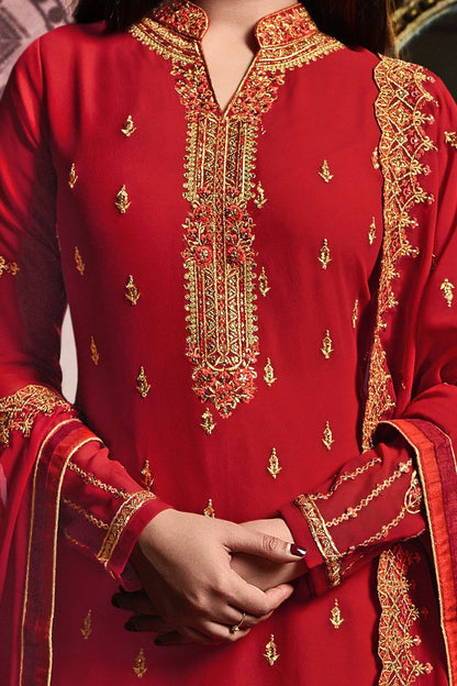 True-Red Faux Georgette suit with light yet graceful artwork all through.