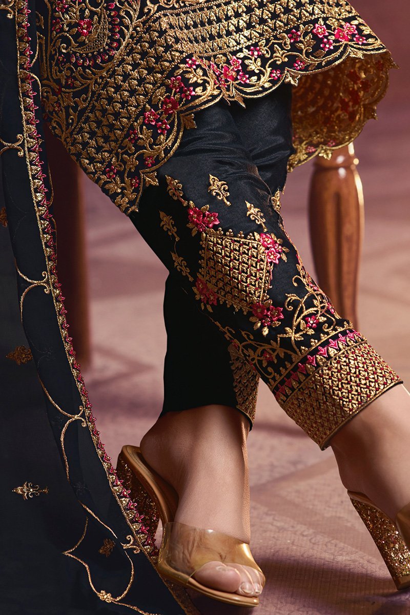 Navy Blue Faux Georgette suit with traditional artwork and embroidery