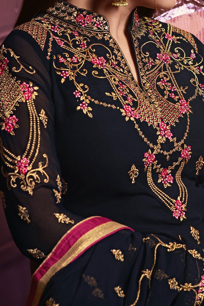 Navy Blue Faux Georgette suit with traditional artwork and embroidery