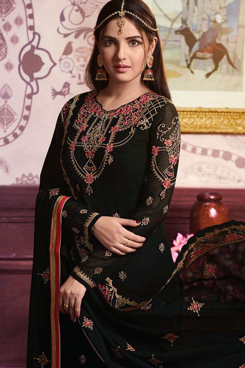 Faux Georgette suit in Midnigh-Black shade with ample of traditional artwork