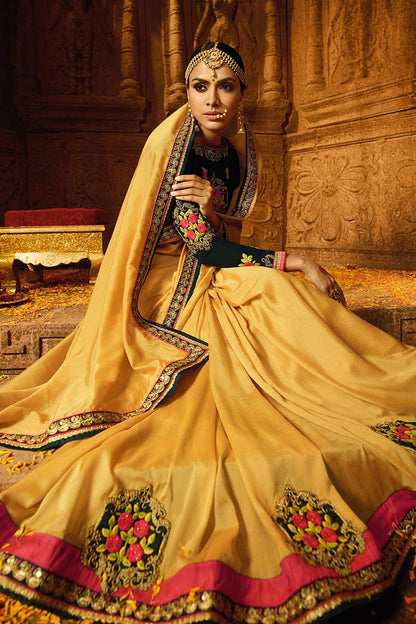 Mustered colored Silk Saree with Heavy Blouse