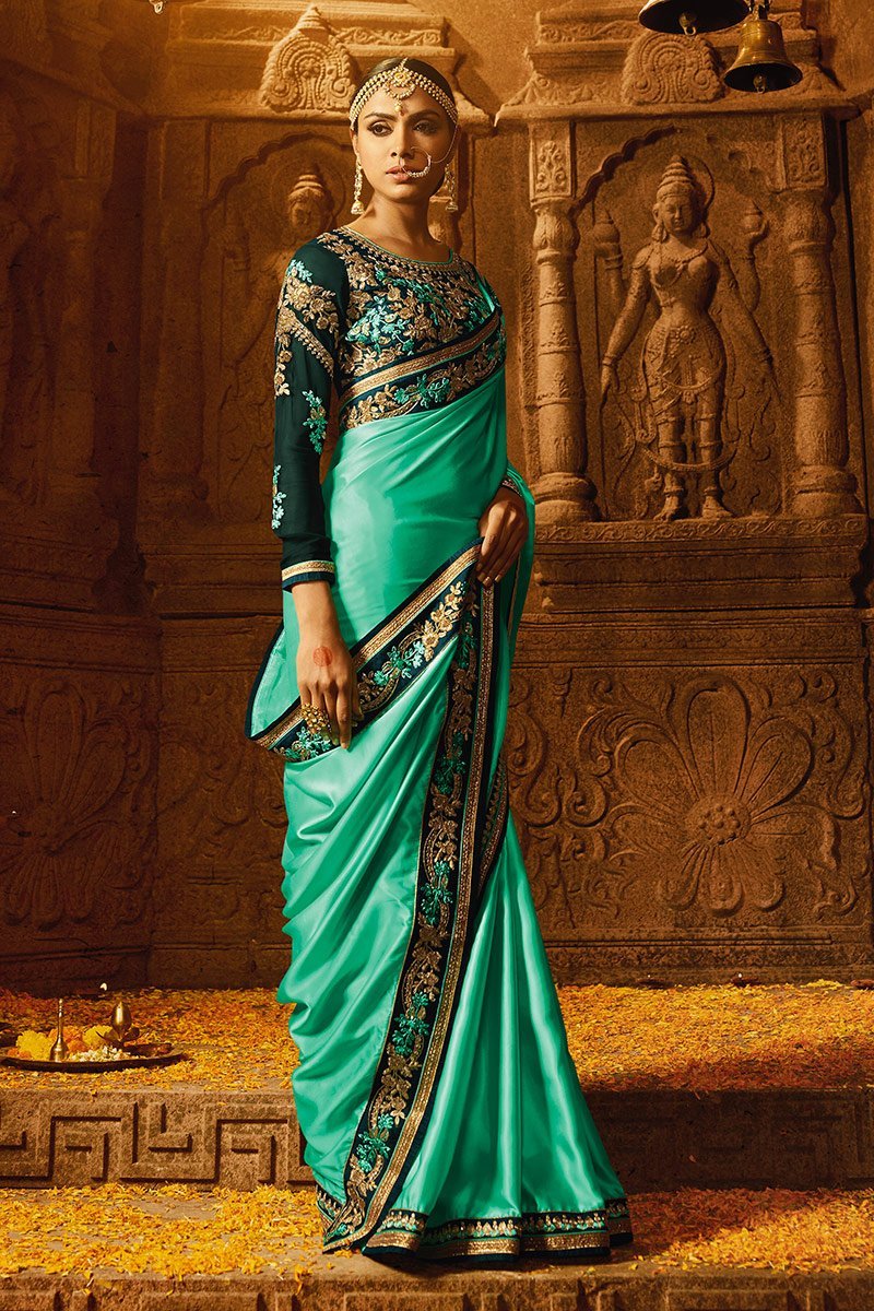 Mint-Green colored Silk Saree with Heavy Blouse