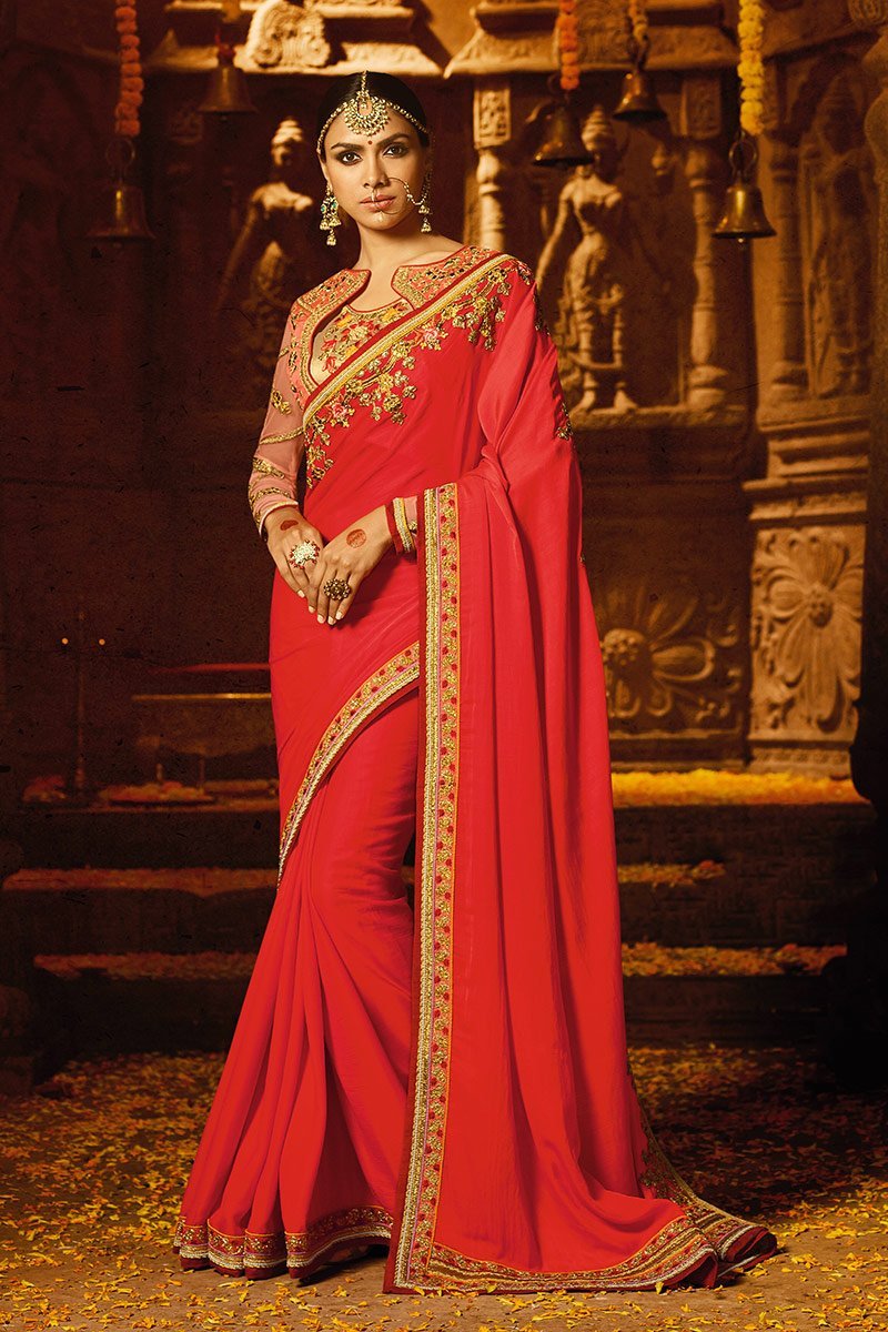 Candy Apple-Red colored Silk Saree with heavy Blouse