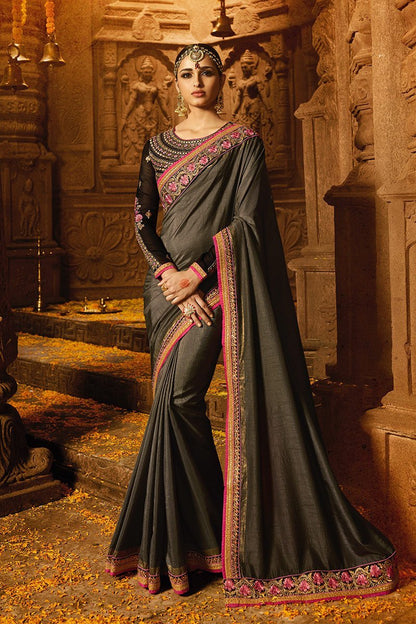 Grey colored Silk Saree with Heavy Blouse