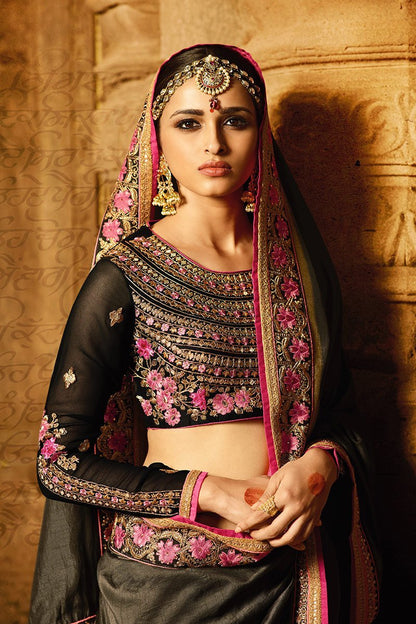 Grey colored Silk Saree with Heavy Blouse