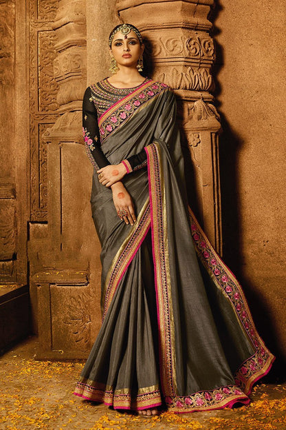 Grey colored Silk Saree with Heavy Blouse