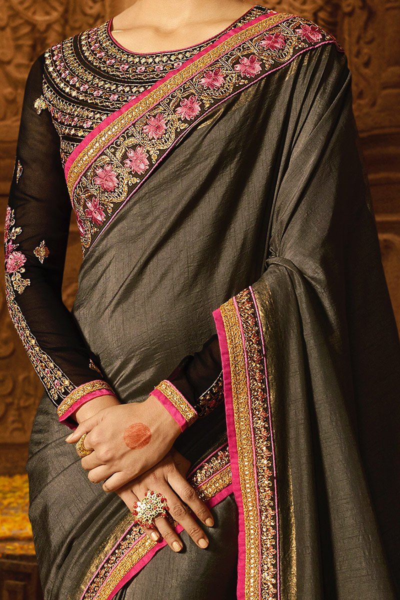 Grey colored Silk Saree with Heavy Blouse