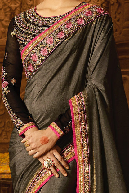 Grey colored Silk Saree with Heavy Blouse