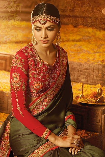 Mehendi-Green colored Silk Saree with Heavy Blouse