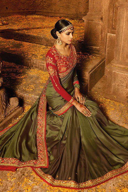 Mehendi-Green colored Silk Saree with Heavy Blouse