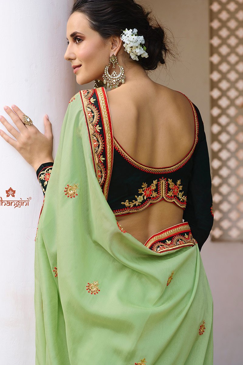 Pista-Green colored Silk Saree with Bottle-Green Blouse