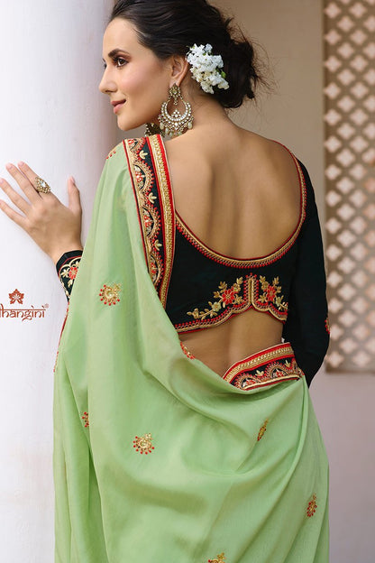 Pista-Green colored Silk Saree with Bottle-Green Blouse