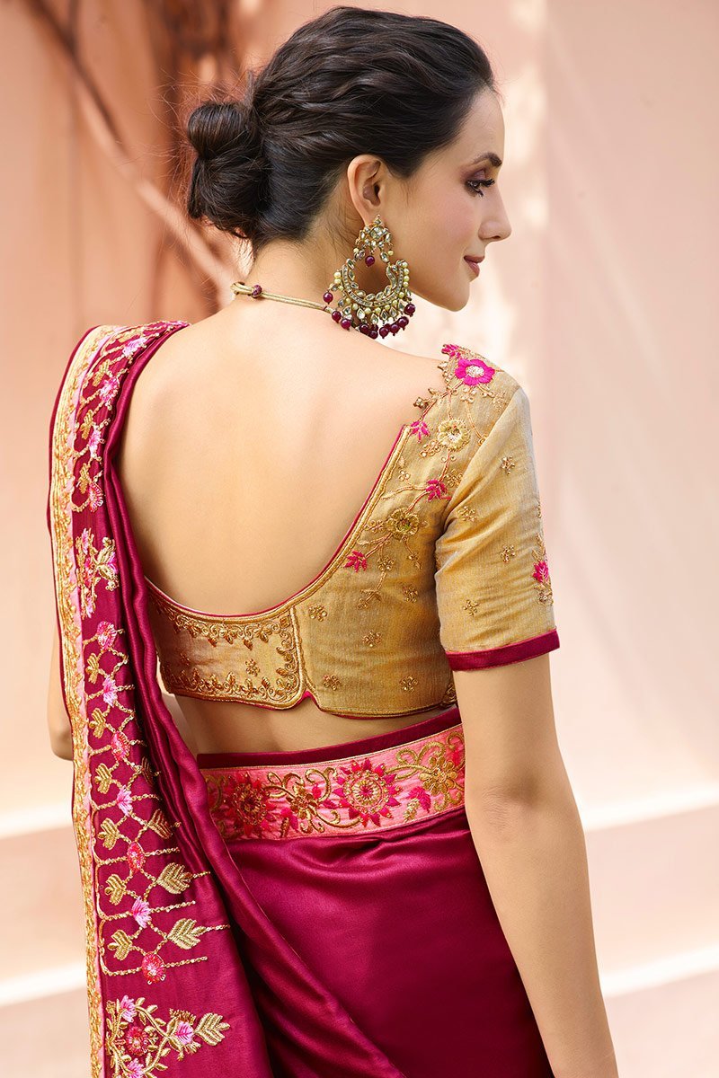 Wine Colored Silk Saree with Gold Colored Blouse