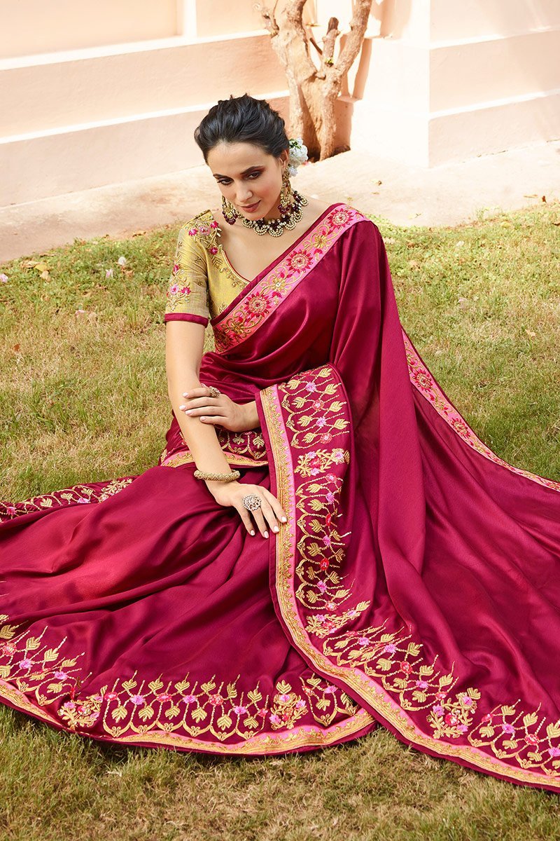 Wine Colored Silk Saree with Gold Colored Blouse