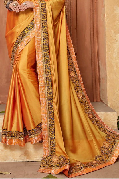 Yellow Saree and Brown Blouse with heavy embroidery
