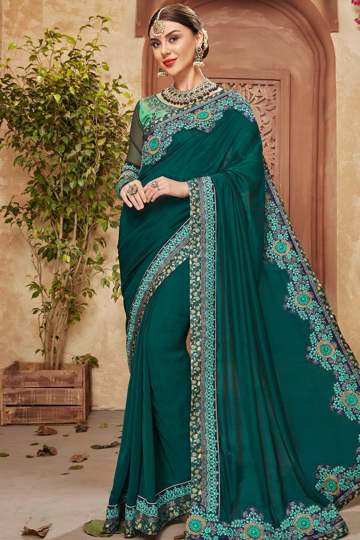 Green Saree and matching Blouse with heavy embroidery
