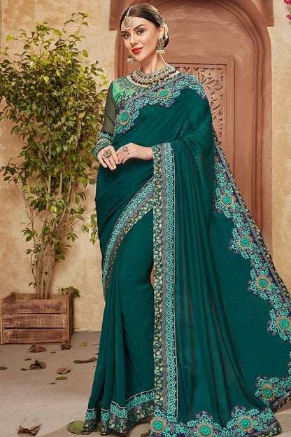 Green Saree and matching Blouse with heavy embroidery