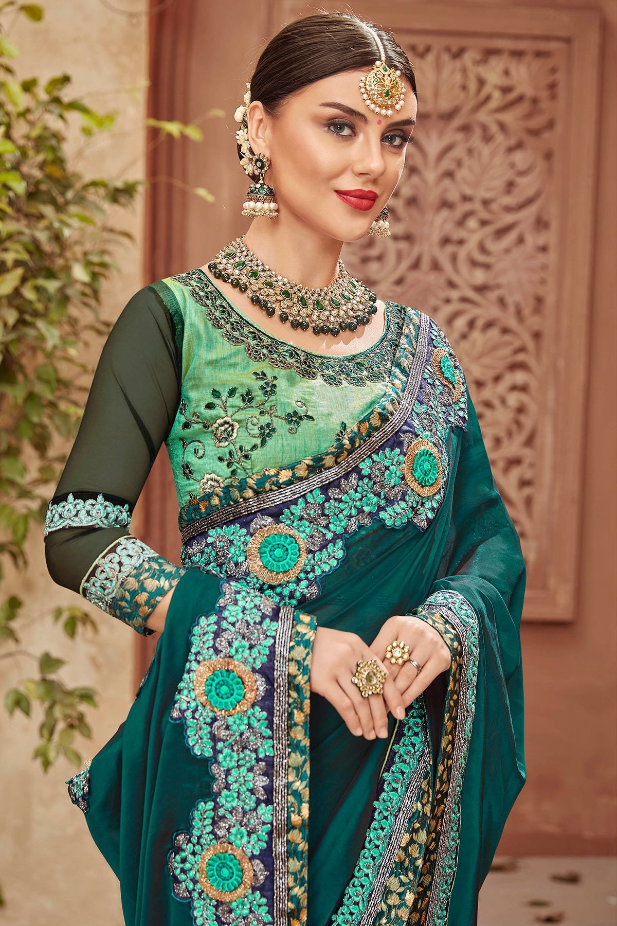 Green Saree and matching Blouse with heavy embroidery