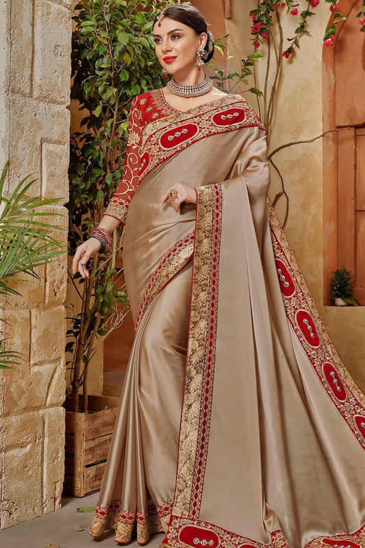 Brown Saree and Rd Blouse with heavy embroidery