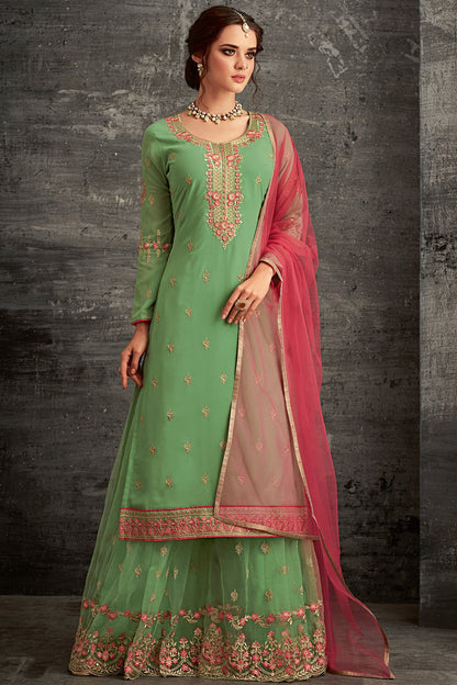 Georgette party wear Sharara suit in Green with Pink Dupatta