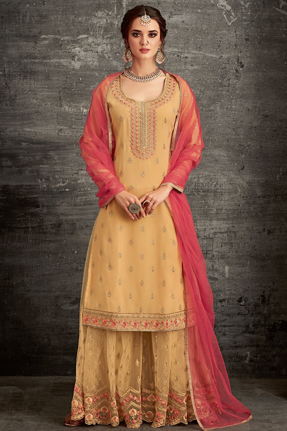 Georgette party wear Sharara suit in Yellow with Pink Dupatta