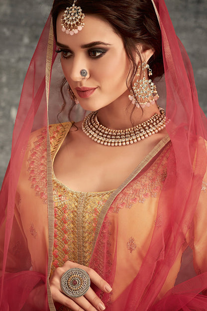 Georgette party wear Sharara suit in Yellow with Pink Dupatta