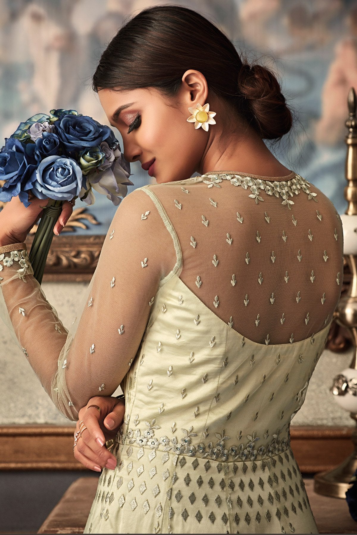 All White Anarkali suit with exclusive stone works and motifs