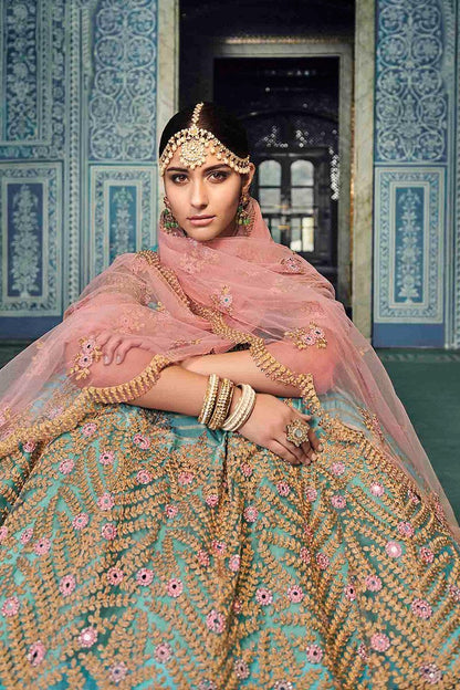 Turquoise Blue Colored Party Wear Lehenga Set