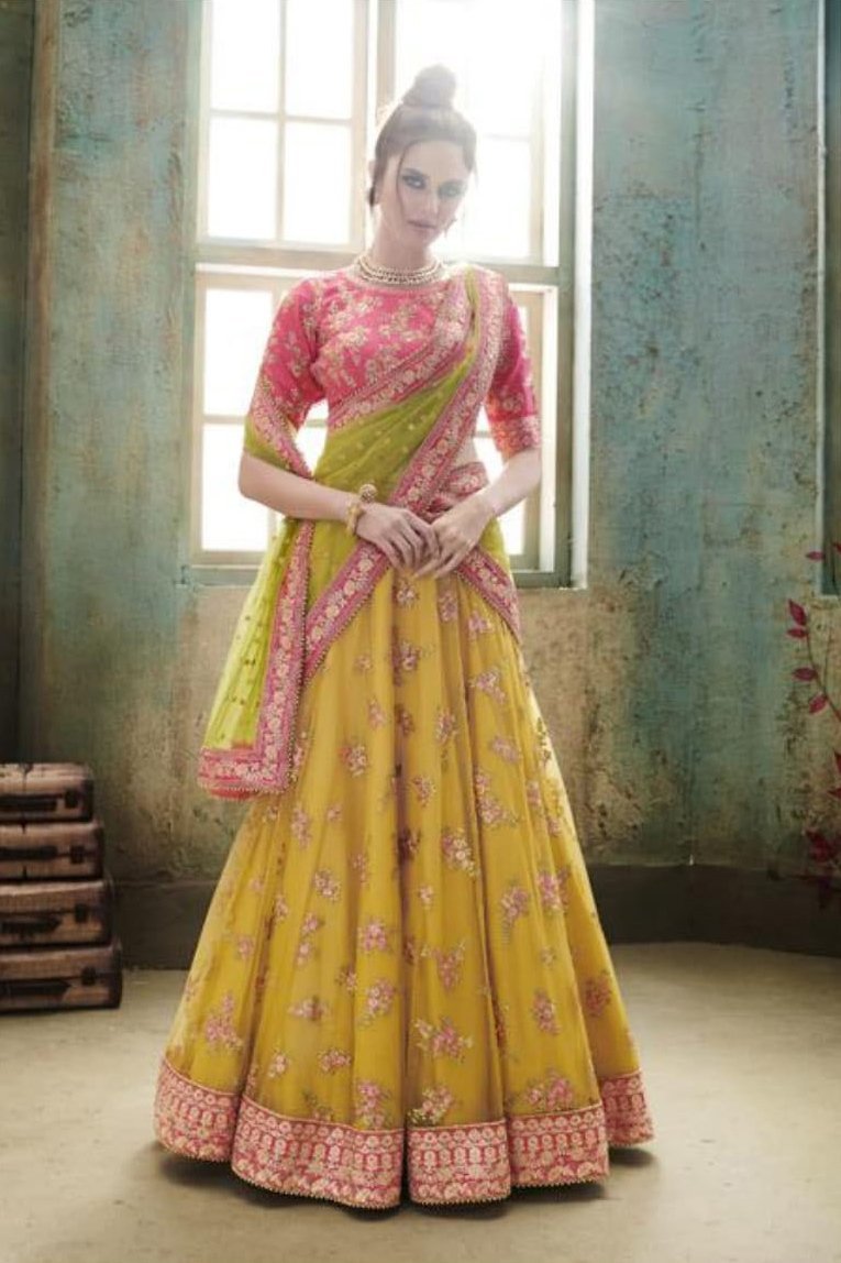 Rani Pink and Mustard colored Party Wear Lehenga Set