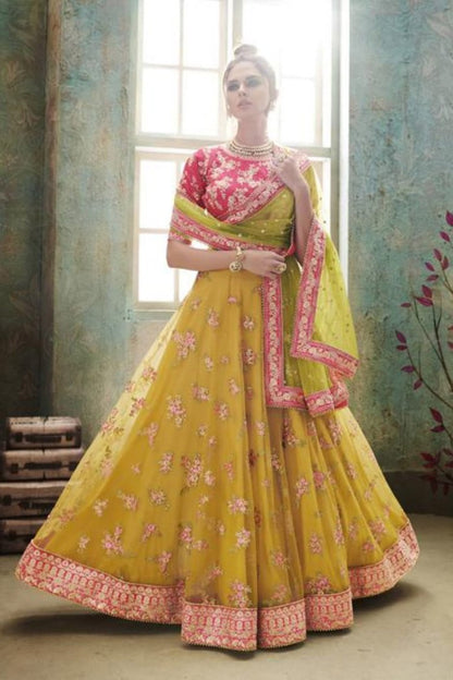 Rani Pink and Mustard colored Party Wear Lehenga Set