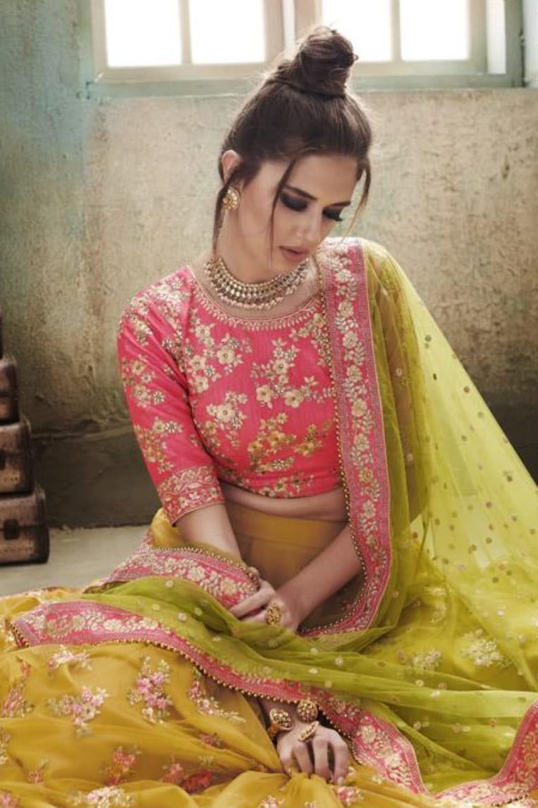 Rani Pink and Mustard colored Party Wear Lehenga Set