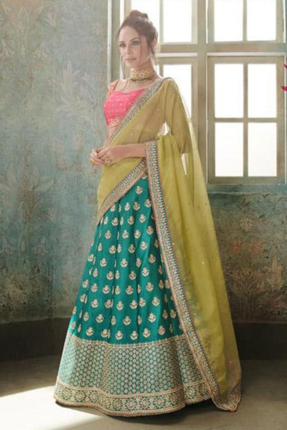 Morpich and Rani Pink colored Party Wear Lehenga Set