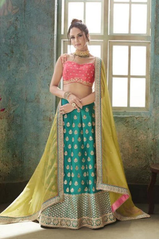 Morpich and Rani Pink colored Party Wear Lehenga Set