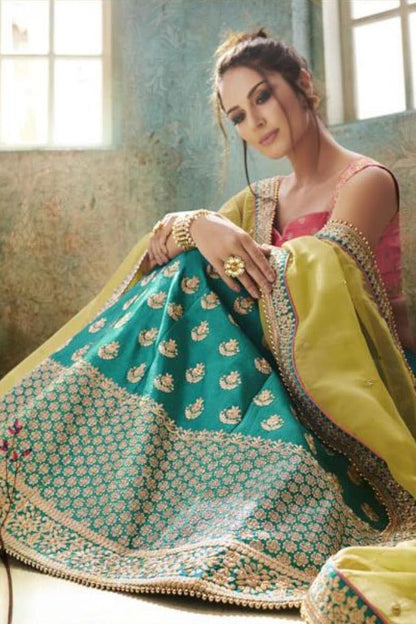 Morpich and Rani Pink colored Party Wear Lehenga Set