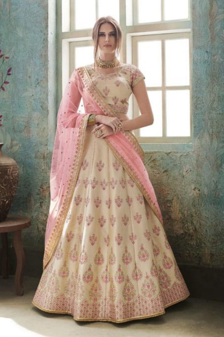 Tussar and Peach colored Party Wear Lehenga Set