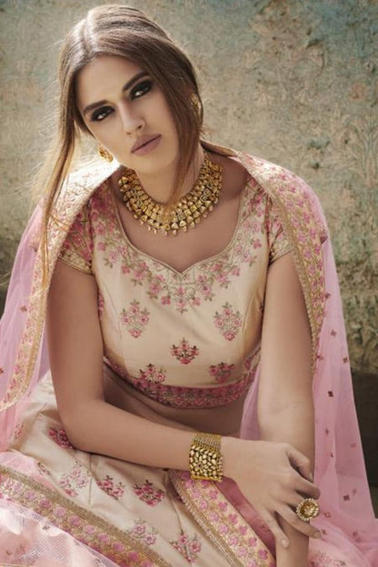 Tussar and Peach colored Party Wear Lehenga Set