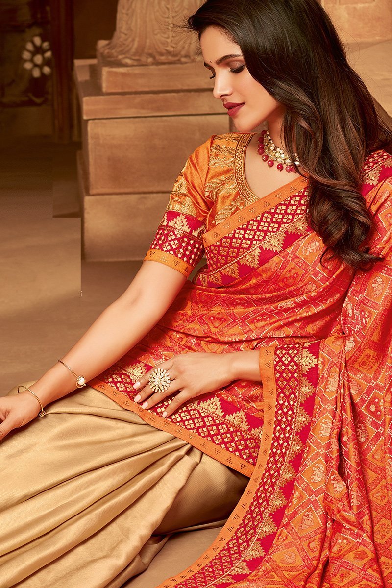 Orange and Gold two-toned Embroidered Designer heavy Silk Saree