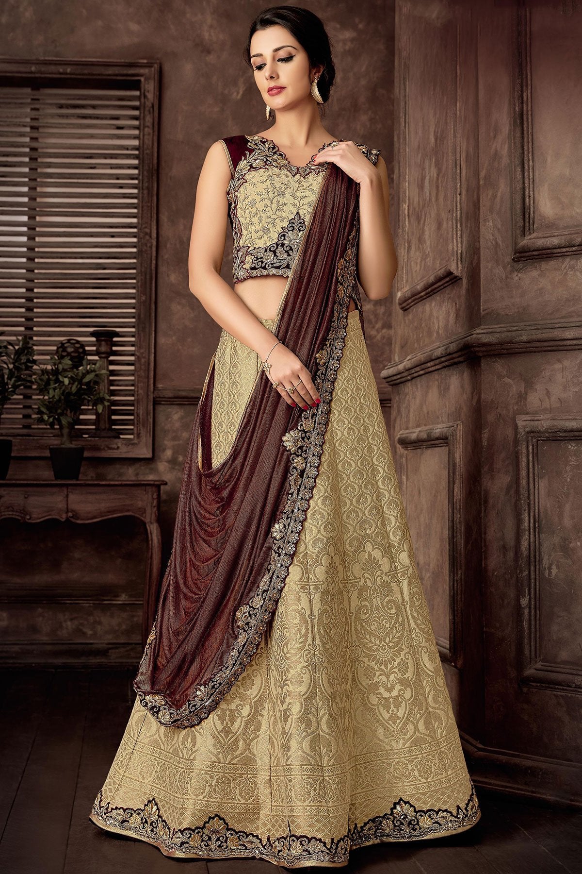 Yellow colored Lehenga Set with Brown Dupatta