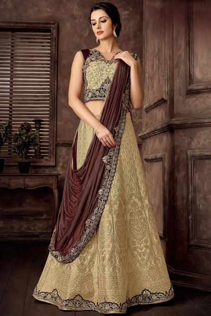 Yellow colored Lehenga Set with Brown Dupatta